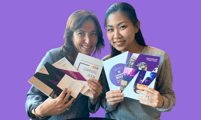 Vikki and Nat holding up copies of the MMSS books