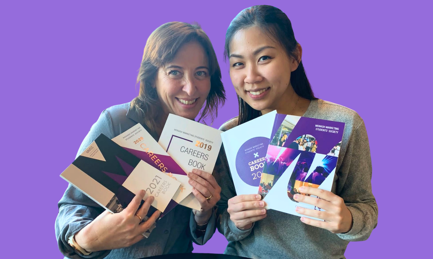Vikki and Nat holding up copies of the MMSS books
