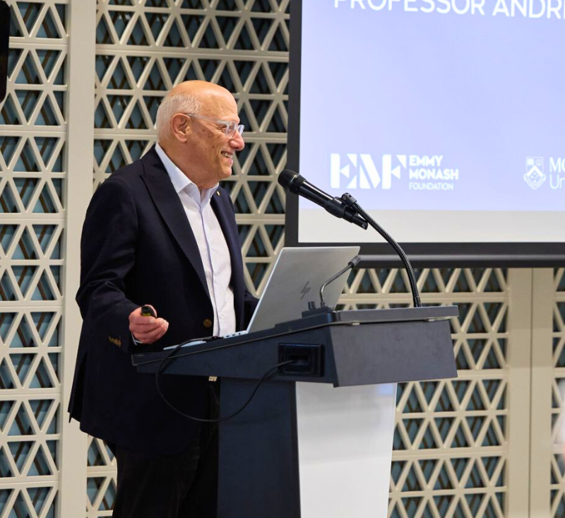 Professor presenting at an Emmy Monash presentation