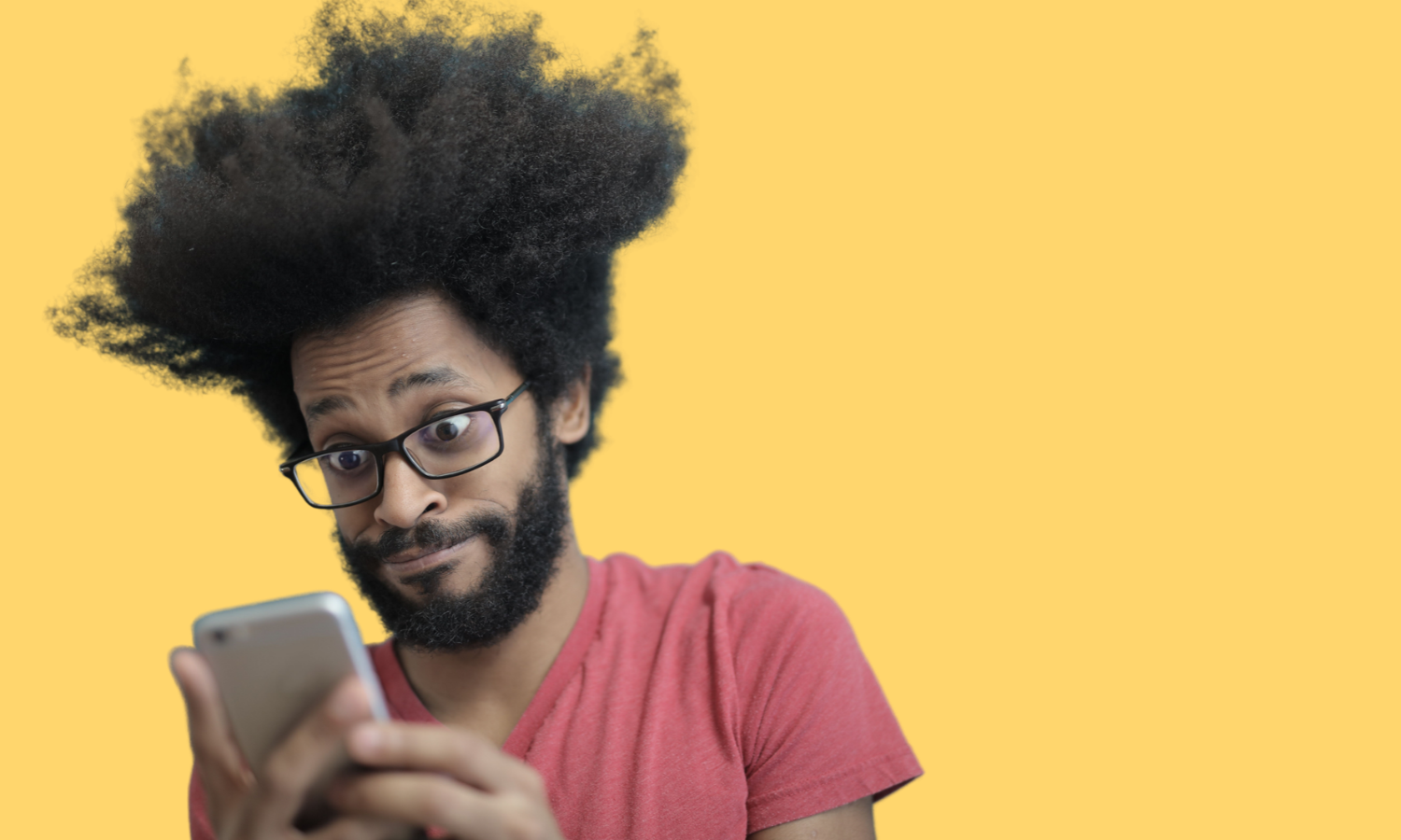man scrolling on phone